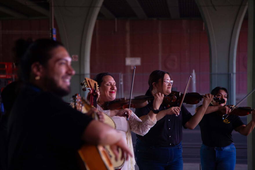 Mariachi band plays