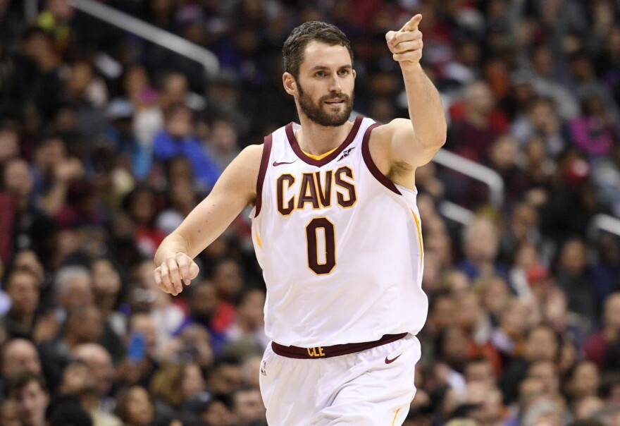 Cleveland Cavaliers forward Kevin Love (0) points after he scored during the second half of an NBA basketball game against the Washington Wizards, Sunday, Dec. 17, 2017, in Washington. The Cavaliers won 106-99. (AP Photo/Nick Wass)