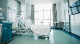 Recovery Room with beds and comfortable medical. Interior of an empty hospital room. Clean and empty room with a bed in the new medical center