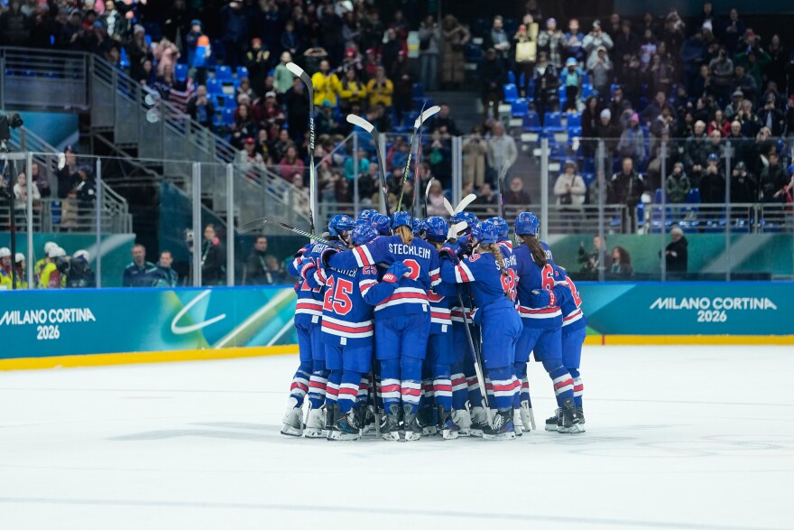 U.S. players celebrate after a semifinal match of women's ice hockey between the United States and Sweden at the 2026 Winter Olympics, in Milan, Italy, Monday, Feb. 16, 2026. (AP Photo/Petr David Josek)