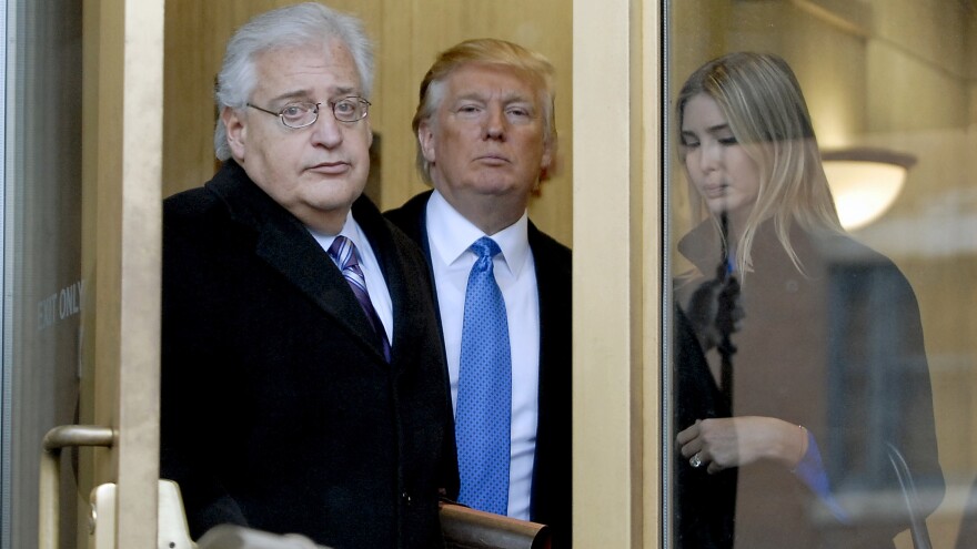 Attorney David Friedman (left) exits U.S. Bankruptcy Court in Camden, N.J., with Donald Trump and Trump's daughter Ivanka in a 2010 case involving Atlantic City casinos. The president-elect plans to nominate Friedman as U.S. ambassador to Israel.