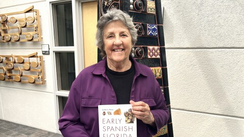 Dr. Judy Bense with her latest book, "Early Spanish Florida."