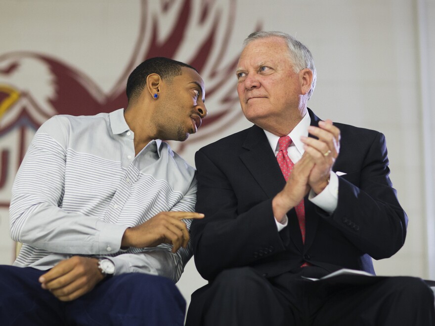 Republican Gov. Nathan Deal visits a charter school in Riverdale, Ga., with rapper Ludacris.