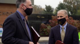 EPA Region 5 Administrator Kurt Thiede (left) and Jim McGoff with the Indiana Finance Authority (right) in front of North Grove Elementary School in Greenwood.