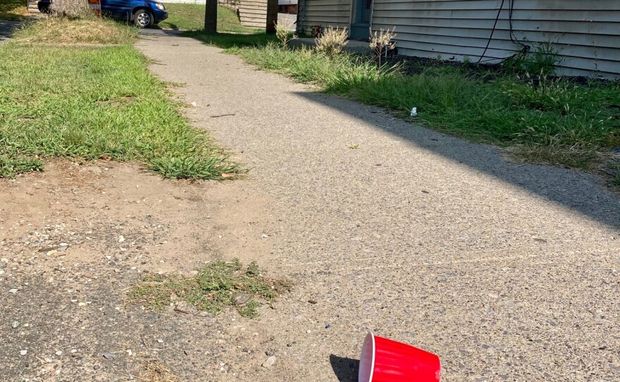 A plastic cup apparently left over from the weekend mass gathering.