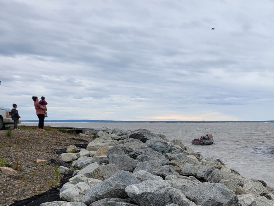 Calla and Elias watch their father's boat leave for the Nushagak opener on Wednesday June 26, 2024 with their mother Keilyn Flensburg.