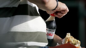 Ditching sugar-sweetened drinks in favor of diet ones shaves the empty calories. But it doesn't help if you make up for those calories on your plate.