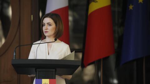Moldova's President Maia Sandu pauses as she speaks to the media during a conference at the Presidential Palace in Chisinau, Moldova, Wednesday, June 15, 2022. (Yoan Valat/Pool via AP)