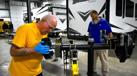 Ralph Decker completes his last practical exam under the supervision of instructor Mike Curl at the RV Technical Institute.