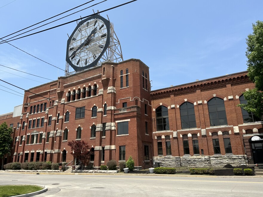 The facade of the former Colgate-Palmolive plant and its iconic giant clock in Clarksville.