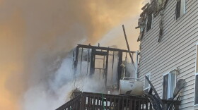 An image of the fire that consumed one house and damaged four others on S Wickens St. in Bloomington.