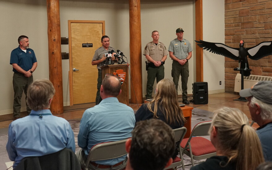 Grand Canyon National Park deputy superintendent Brian Drapeaux, flanked by local officials and park leaders, speaks to the press at the park's headquarters on Monday, August 31, 2026.