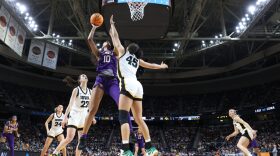 Angel Reese #10 of the LSU Tigers shoots the ball during the first half against the Iowa Hawkeyes in the Elite 8 round of the NCAA Women's Basketball Tournament at MVP Arena in Albany, New York.