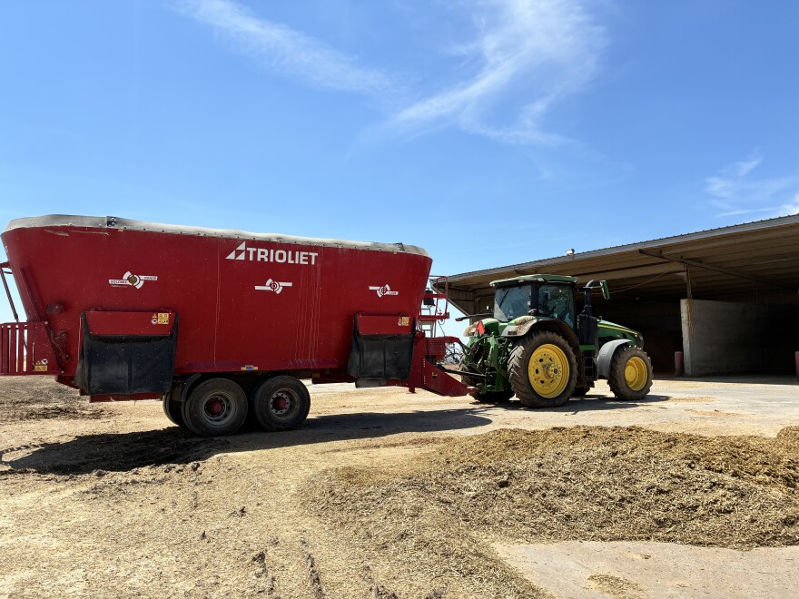 Tractors pull trailers full of feed all day during harvest season. The feed is water-intensive, something the industry will have to manage for long-term success.