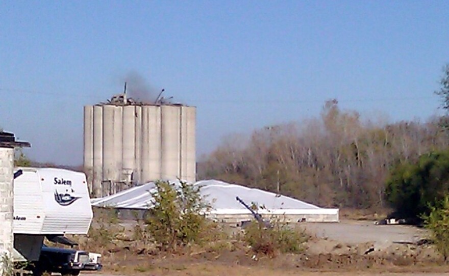 Bartlett elevator in Atchison, KS still smouldered, day after deadly grain dust blast.