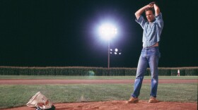 Kevin Costner warms up to pitch in the 1989 film <em>Field Of Dreams</em>.