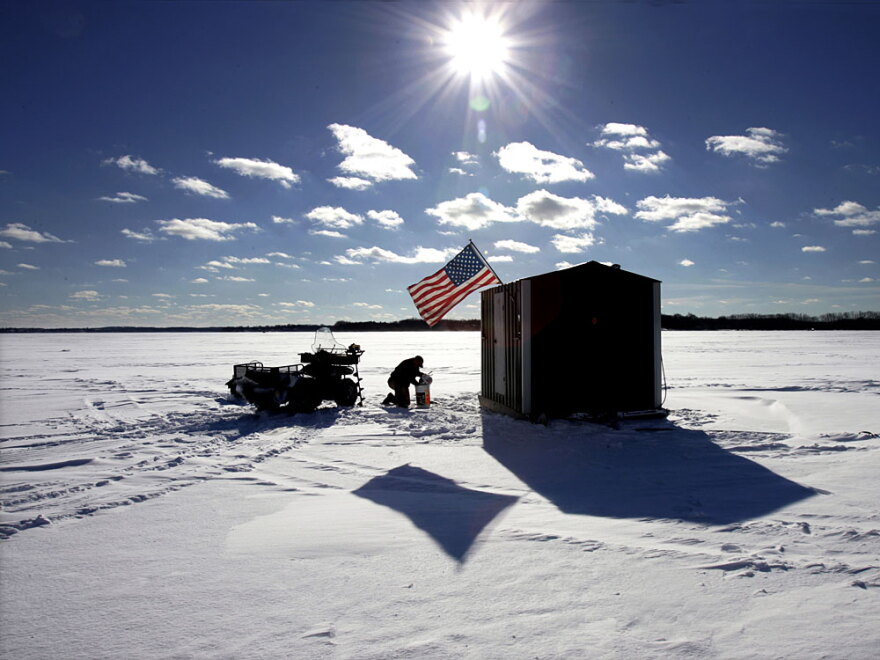 Could ice shanties like this one, built on Wisconsin's Lake Waubesa in 2005, be considered something of an economic indicator?