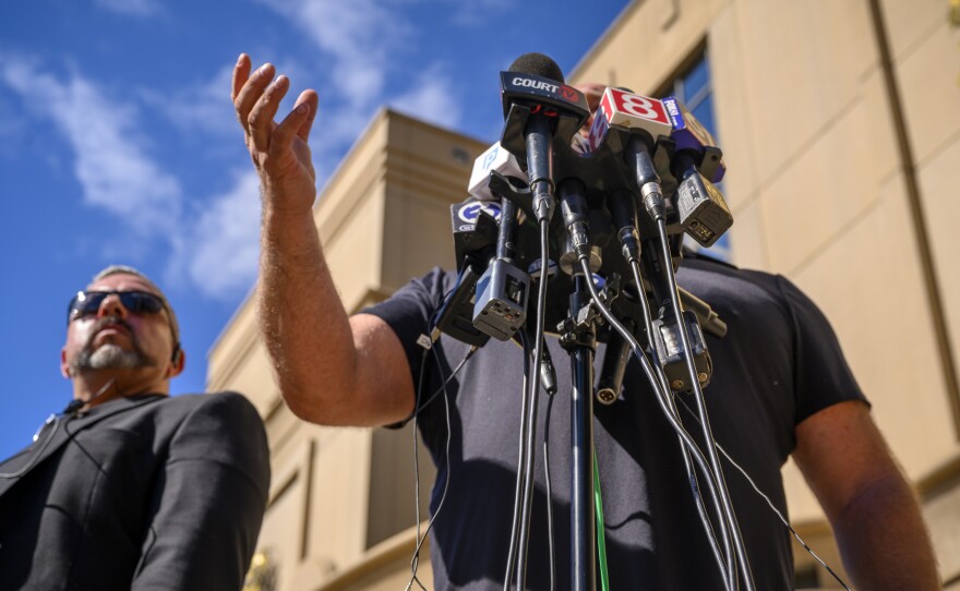 Conspiracy talk show host Alex Jones speaks with the media outside Waterbury Superior Court during a trial to determine the amount of money Jones owes for spreading the lie that the 2012 mass shooting in Newtown didn’t happen.