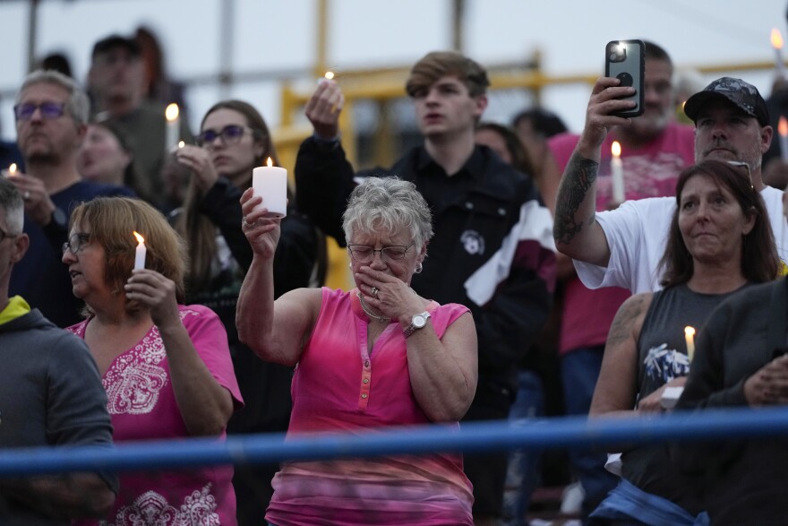 Family, friends and community attend a candlelight vigil for Corey Comperatore, the former fire chief shot and killed at a weekend rally for former President Donald Trump, Wednesday, July 17, 2024, at Lernerville Speedway in Sarver, Pa.