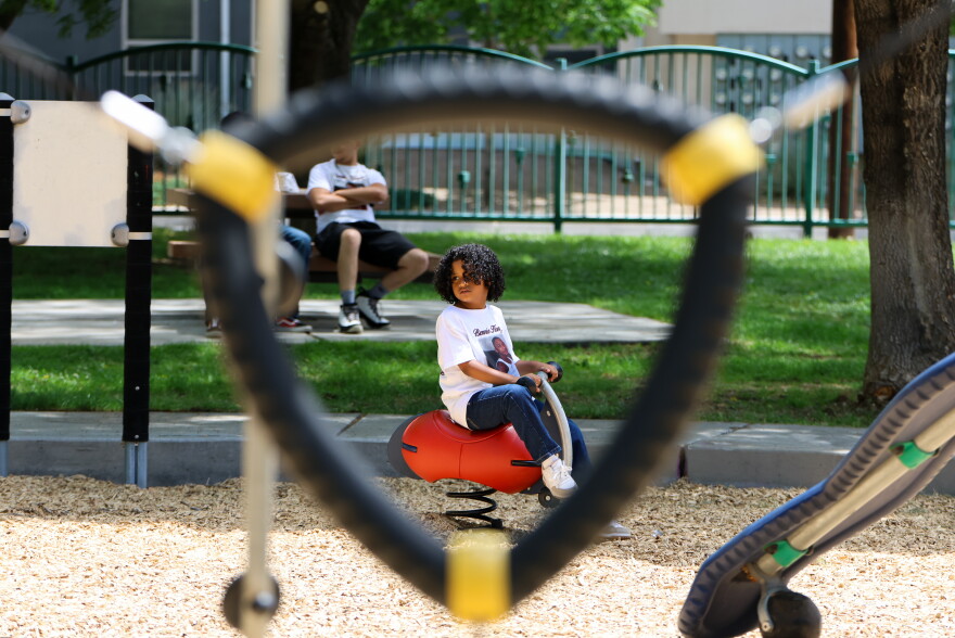 A member of Bennie Hargrove's family plays at a park renamed in honor of heroic 13-year-old