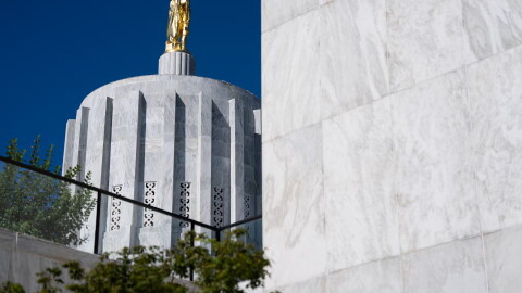 The Oregon Pioneer statue sits atop the Oregon State Capitol in Salem, Ore., on Sept. 8, 2026.