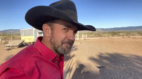 FILE - In this May 12, 2021, file photo, Otero County Commissioner Couy Griffin, the founder of Cowboys for Trump, takes in the view from his ranch in Tularosa, N.M. In a written order obtained by The Associated Press on Feb. 16, 2022, the Denver-based U.S. 10th District Court of Appeals declined to reverse a lower court ruling upholding requirements that Cowboys for Trump register as a political committee in New Mexico and possibly disclose information on expenditures and contributions.