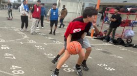 Fort Miller Middle School students in Fresno Unified play a game of basketball during the school's new lunchtime sports program. The goal of the program, which started in October, is to provide structured activities when students are out of the classroom. The sports program is one of nearly 30 ways the district is spending $30 million to support students as part of a 2023 agreement with the teachers union.