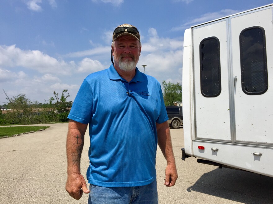 Contractor Glenn Mogle is co-owner of company Anyweather Roofing and Restoration. He and his workers were busy repairing a damaged roof in Trotwood.