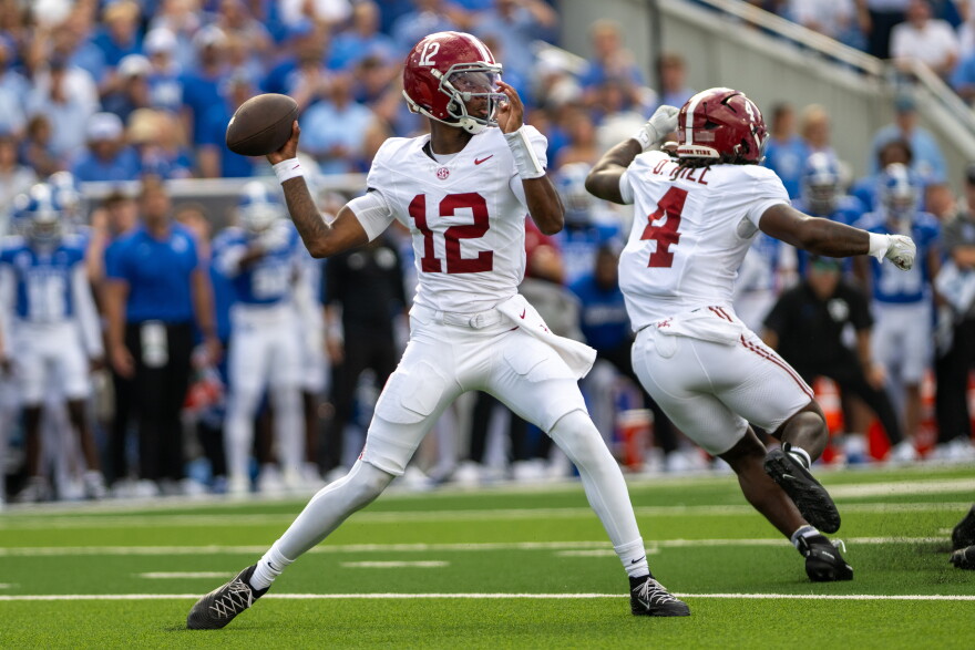 Alabama quarterback Keelon Russell (12) drops back to pass during the first half of an NCAA college football game against Kentucky, Saturday, Sept. 12, 2026, in Lexington, Ky. (AP Photo/Tony Wagner)