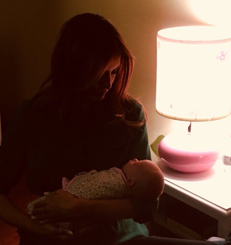 First Lady Melania Trump with an infant born affected by opioids.