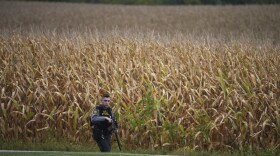 A Pennsylvania state police trooper patrols a road after multiple police officers were shot and killed on Wednesday, Sept. 17, 2025, in North Codorus.