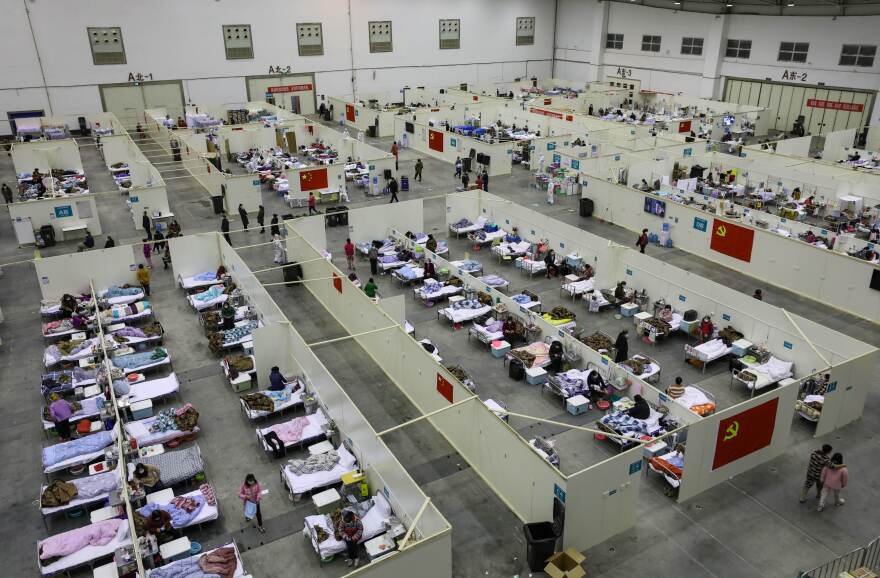 A temporary hospital set up in an exhibition center in Wuhan, China, on February 18. The hospital, one of the dozen of its kind in Wuhan, hosts COVID-19 patients with mild symptoms.