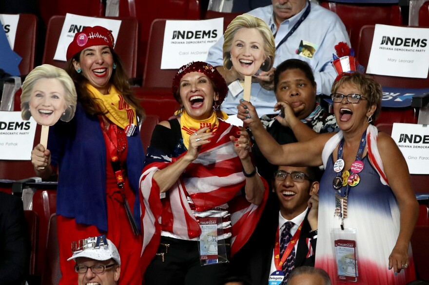 Delegates and attendees cheer during the fourth and final day of the Democratic National Convention.