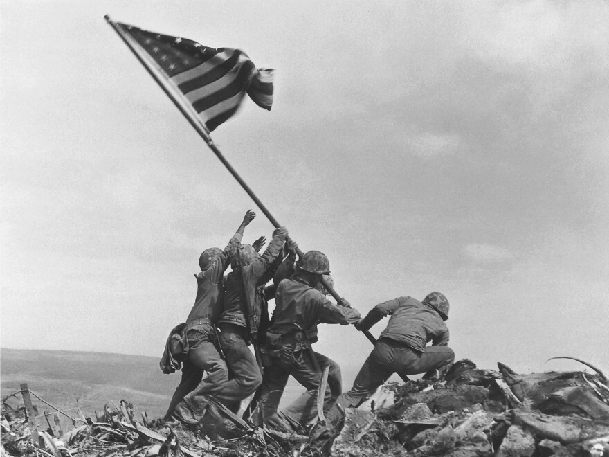 U.S. Marines raise the American flag atop Mount Suribachi, Iwo Jima, on Feb. 23, 1945. The generation who fought in World War II is often called the GI generation or the greatest generation.