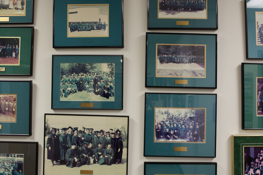 Old Tacoma Program graduation photos hang at Evergreen State College's Tacoma, Wash., campus. Maxine Mimms started the program in 1972.