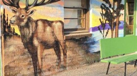 Painted by traveling graffiti artist Jules Muck (known as "Muckrock), an elk stands by the Lake Huron coast. Muck said elks had to be in the full piece, as Atlanta is known as the "elk capital."