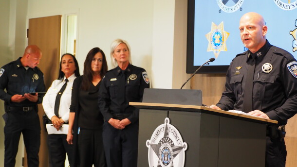 Summit County sheriff's Capt. Justin Hemingway speaks at an Oct. 27, 2026, press conference confirming Ted Bundy as the murderer of Melissa Anne Smith, 17, who died in 1974. Behind him stand (right to left) Summit County Sheriff Kacey Bates,