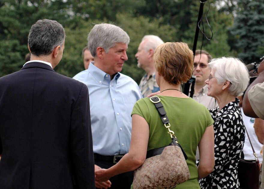 Rick Snyder talking to people