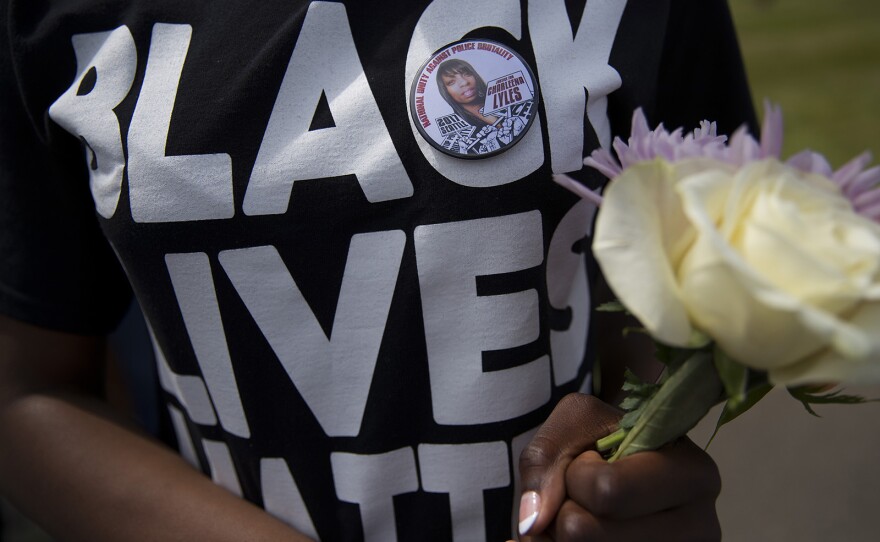 A mourner at Charleena Lyles' burial on Monday, July 10, 2017 wears a 'Black Lives Matter' shirt. Lyles was shot by Seattle Police on June 18.