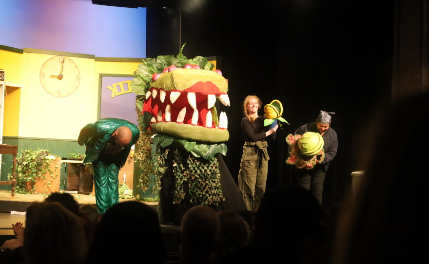 The puppets, puppeteers and talent behind Audrey II in the Brownwood Lyric Theatre’s Little Shop of Horrors. David Nanny, Nate Andrews, Kelly Eddy, Cecilia Cardoza. Photo by Allison Diaz.