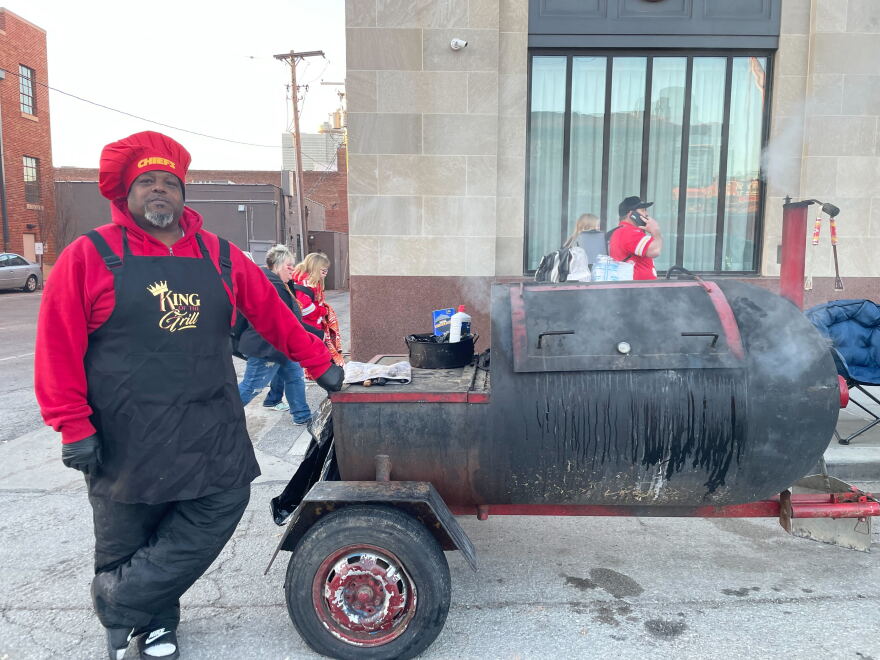 Cortez Garlington brought about 360 hot dogs and his grill to the parade route to feed hungry fans.