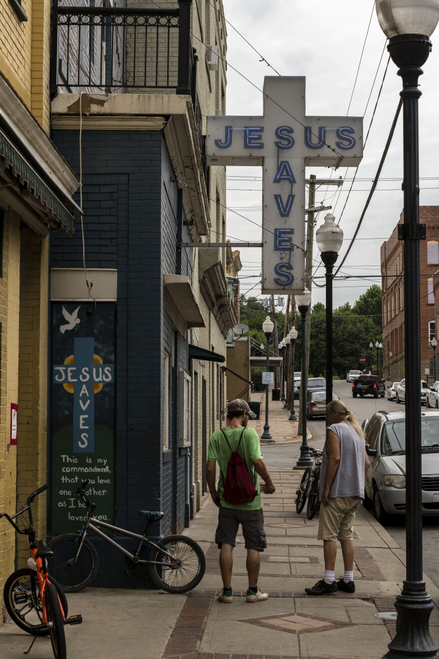 A cross hangs above The Mission on 4th Street in Clarksburg, W.Va.