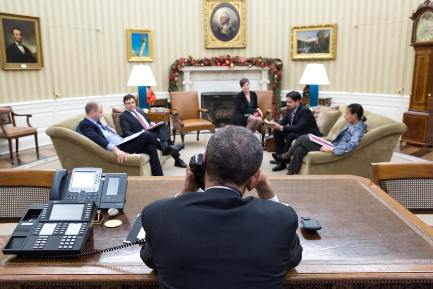 President Obama speaks with President Raul Castro of Cuba from the Oval Office on Tuesday. A day later, both men announced plans to normalize relations between the Cold War-era foes.