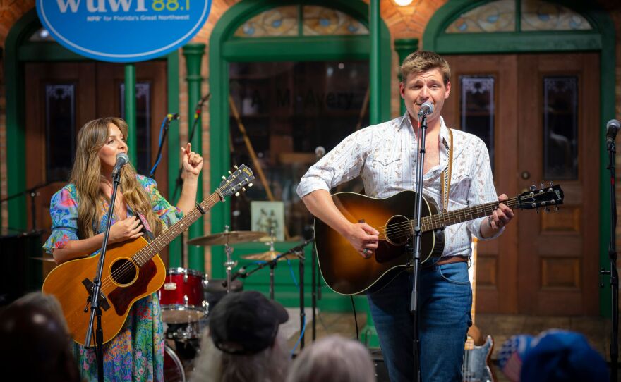 On May 1st, 2025 International recording and touring artists Brit Taylor, Adam Chaffins, and Dillon Warnek performed for a packed house at the Museum of Commerce in Pensacola Florida for WUWF's live NPR broadcast of RadioLive. Photo Credit Elizabeth Linn © All rights reserved