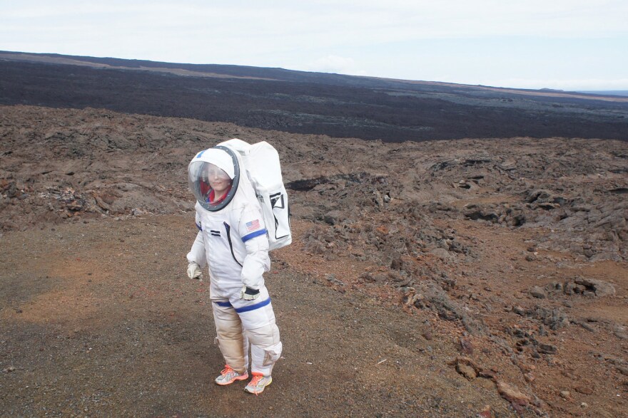 Last year, a crew member of the Hawaii Space Exploration Analog and Simulation mission leaves the dome where they were isolated.