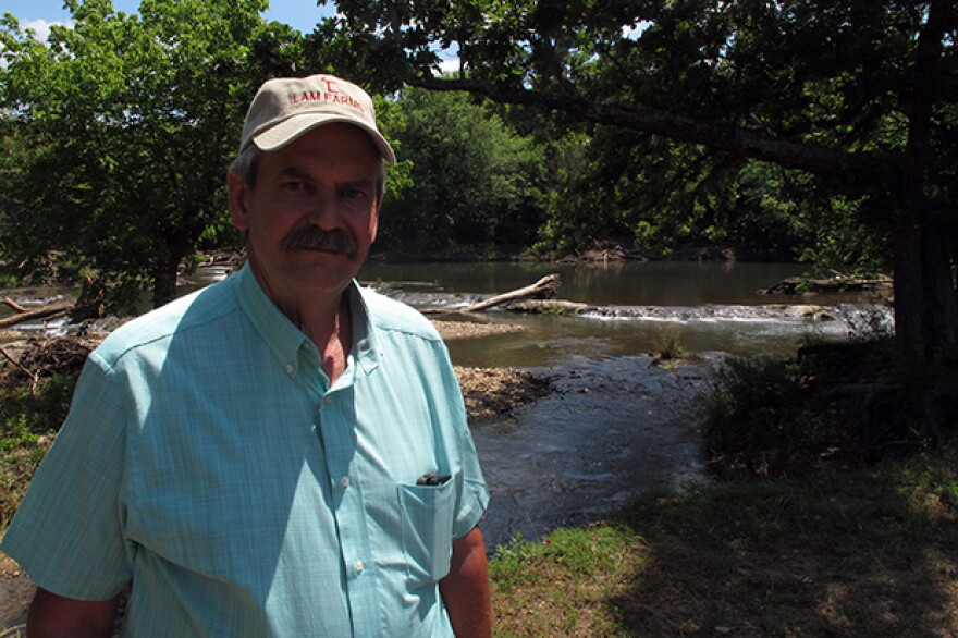 Oklahoma Conservation Commission Executive Director Trey Lam on the bank of the Blue River in south-central Oklahoma. 
