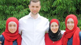 Fady Qaddoura, center, is the first American Muslim to serve as a state lawmaker in Indiana history.