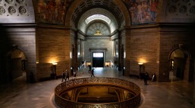 A smattering of people walk through the Missouri Capitol rotunda the morning after the state senate abruptly adjourned on Thursday, May 15, 2025, in Jefferson City.