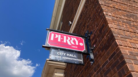 A sign for City Hall in Perry, Iowa.