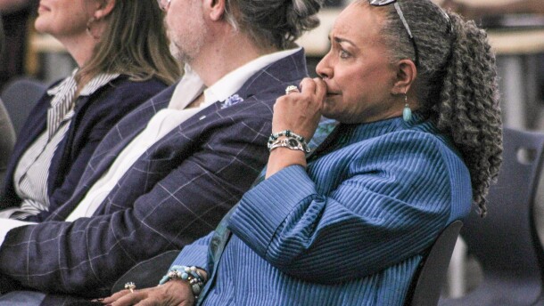 Sheila Brown-Kinnard listens as Wichita Board of Education members vote for her to fill a vacancy on Friday.
